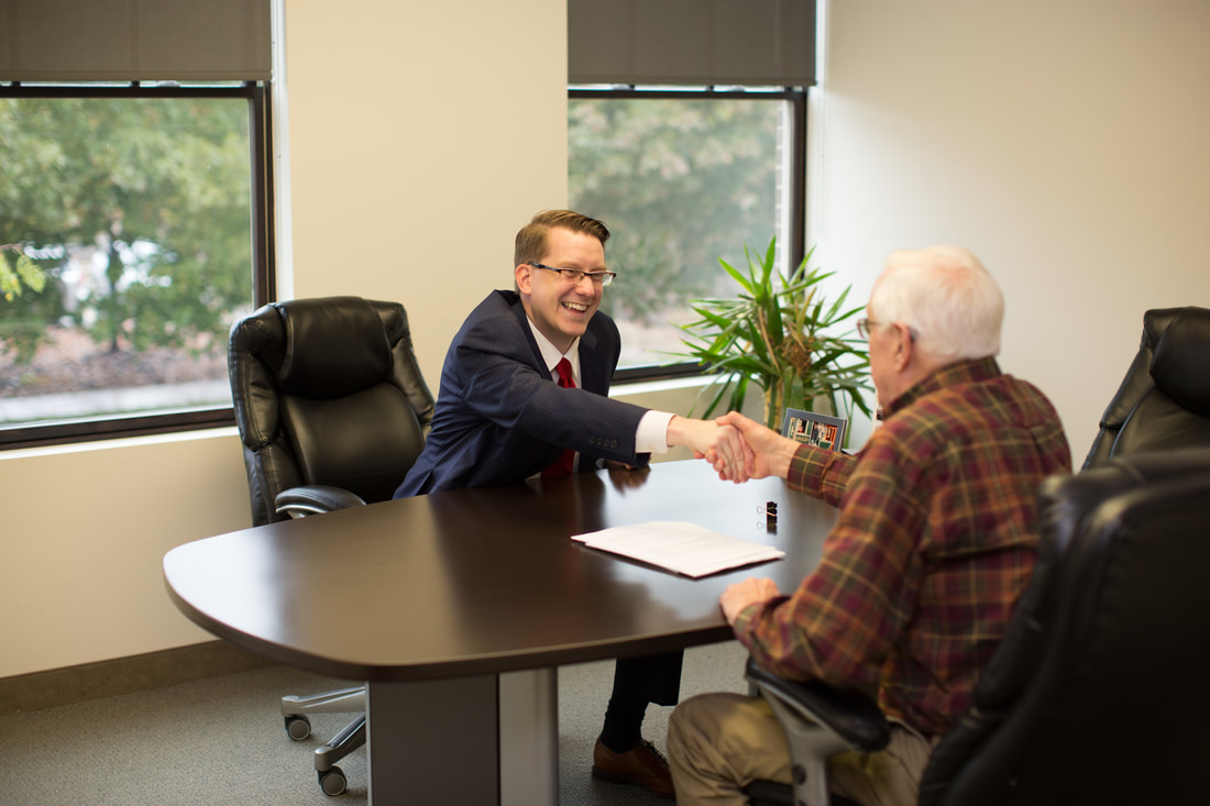 Compassionate elder and probate law attorney Dan Kosmowski meets with client